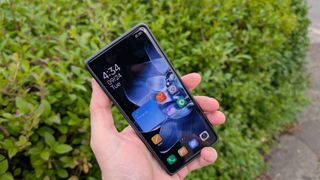 xiaomi mix fold 4 review images showing off the phone from multiple angles