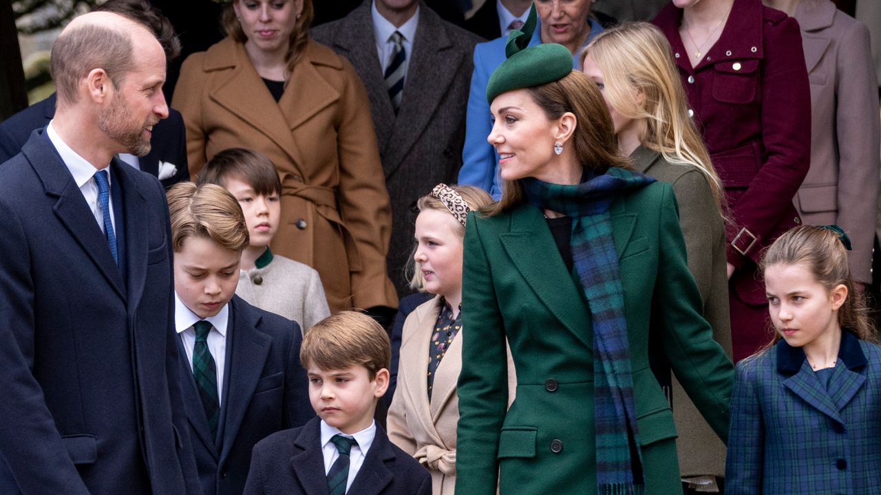 Prince George, Princess Charlotte and Prince Louis wearing blue coats and ties standing outside church with Princess Kate, dressed in a green coat and plaid scarf, and Prince William, in a blue suit, on Christmas Day 2024