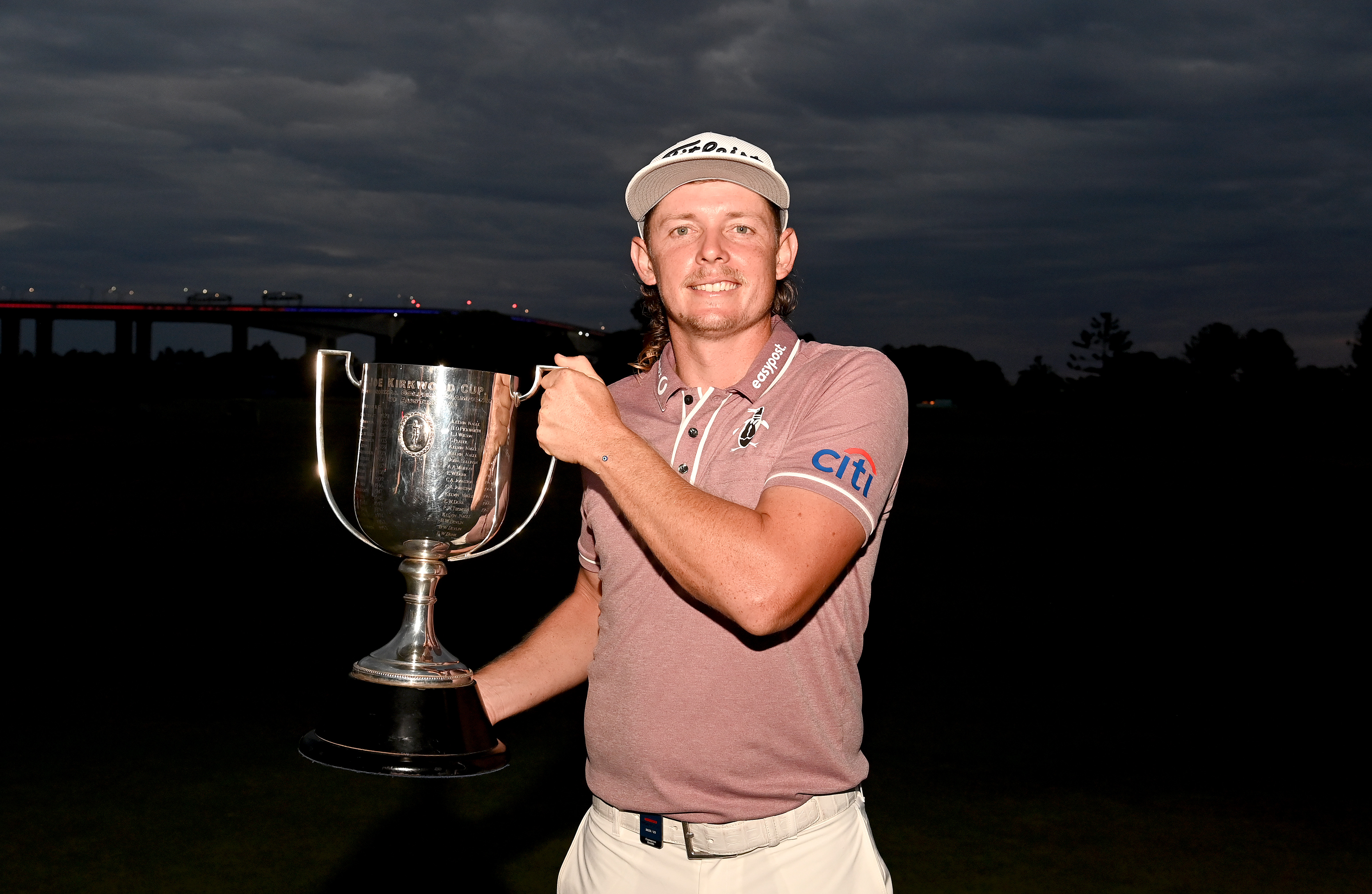 Cameron Smith holds the Kirkwood Cup in 2022