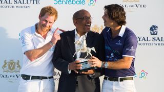 Prince Harry with polo players