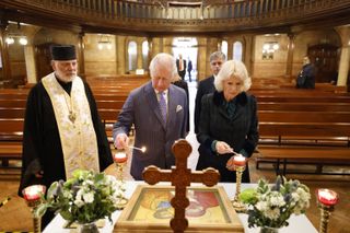 Prince Charles, Prince of Wales and Camilla, Duchess of Cornwall, light candles at the Ukrainian Catholic Cathedral