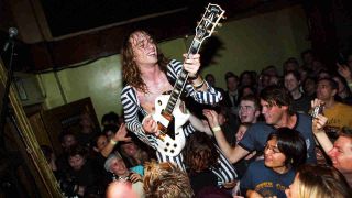 The Darkness’ Justin Hawkins being carried on the shoulders of fans in 2003