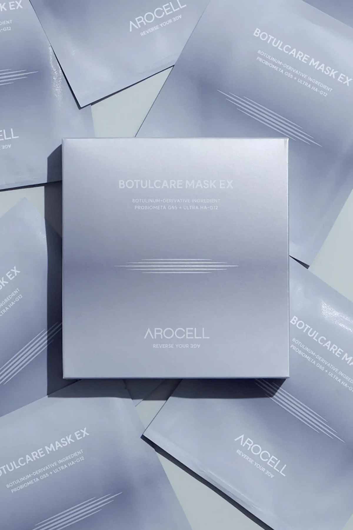 a pile of blue boxes full of sheet masks