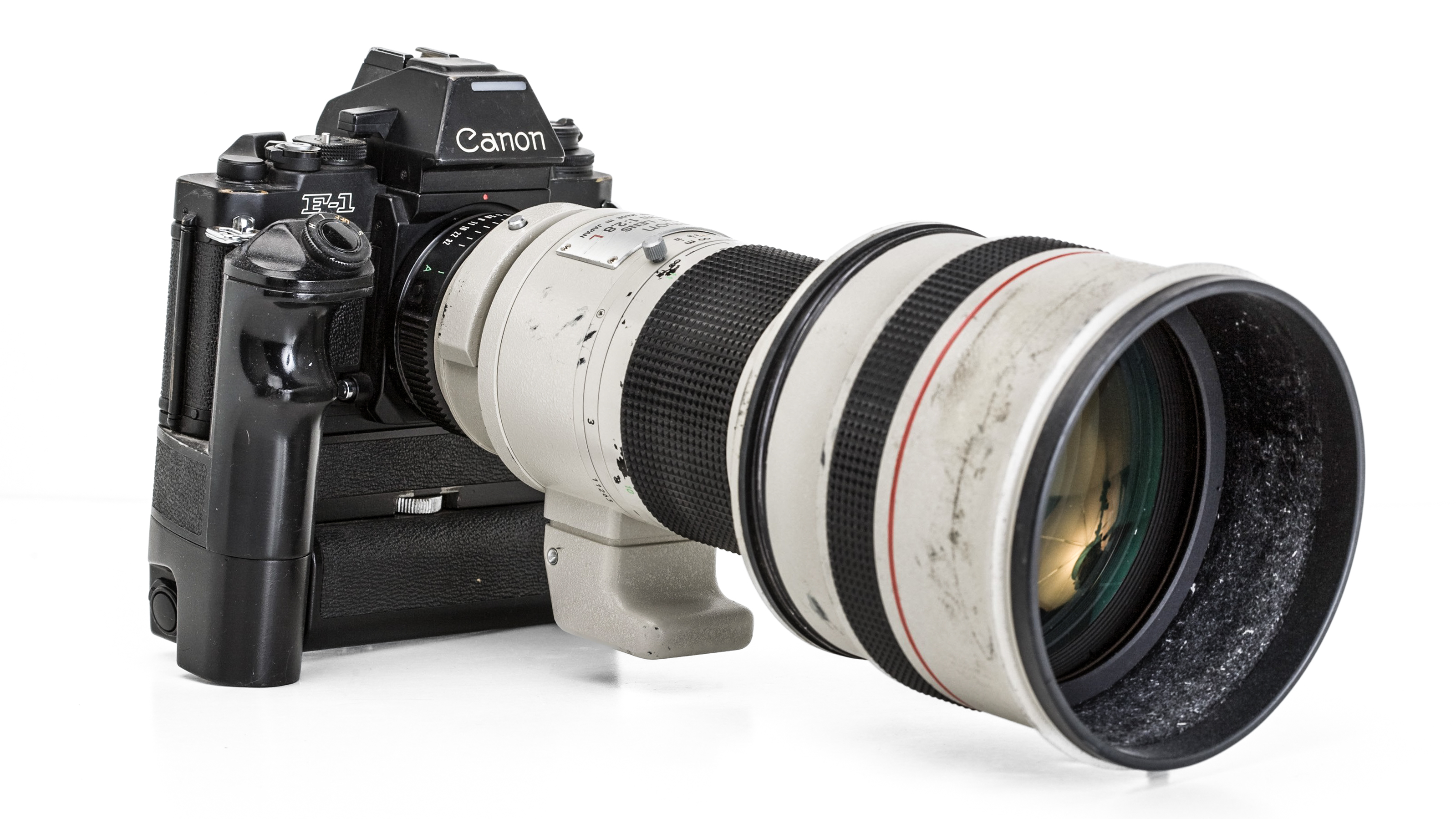 HEALDSBURG, CA - 2009: A Japanese-made Canon F-1 35mm motor-drive camera (circa 1980) fitted with a 300mm f2.8 lens is seen in this 2009 Healdsburg, California, studio photo. (Photo by George Rose/Getty Images)