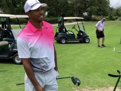 Tiger Woods Shows How To Club Twirl