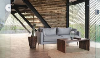 Reception Bamboo Nassor living room with grey sofa