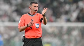 Referee Michael Oliver gestures during the FIFA World Cup Qatar 2022 Group C match between Saudi Arabia and Mexico at Lusail Stadium on November 30, 2022 in Lusail City, Qatar.