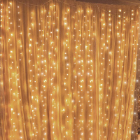 9. Twinkle Star 300 LED Window Curtain String: View at Amazon