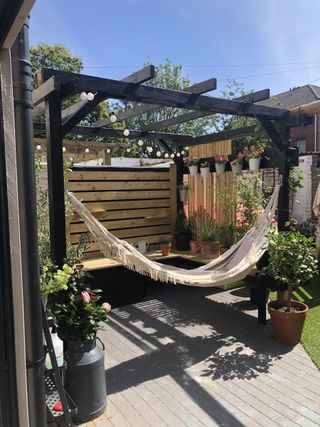 before and after backyard makeover: DIY pergola and hammock