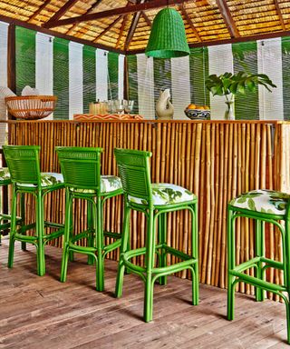 Home bar with tiki island and chairs