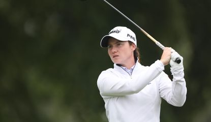 Leona Maguire hits her tee shot and watches the flight of the golf ball