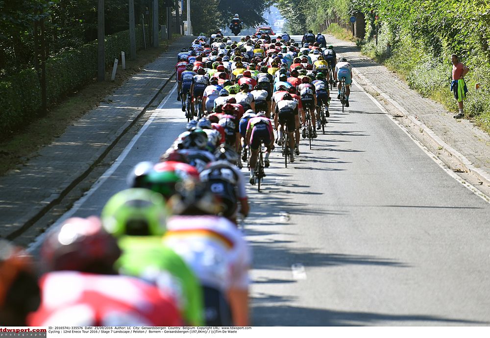 A long lined out peloton at the Eneco Tour on stage 7