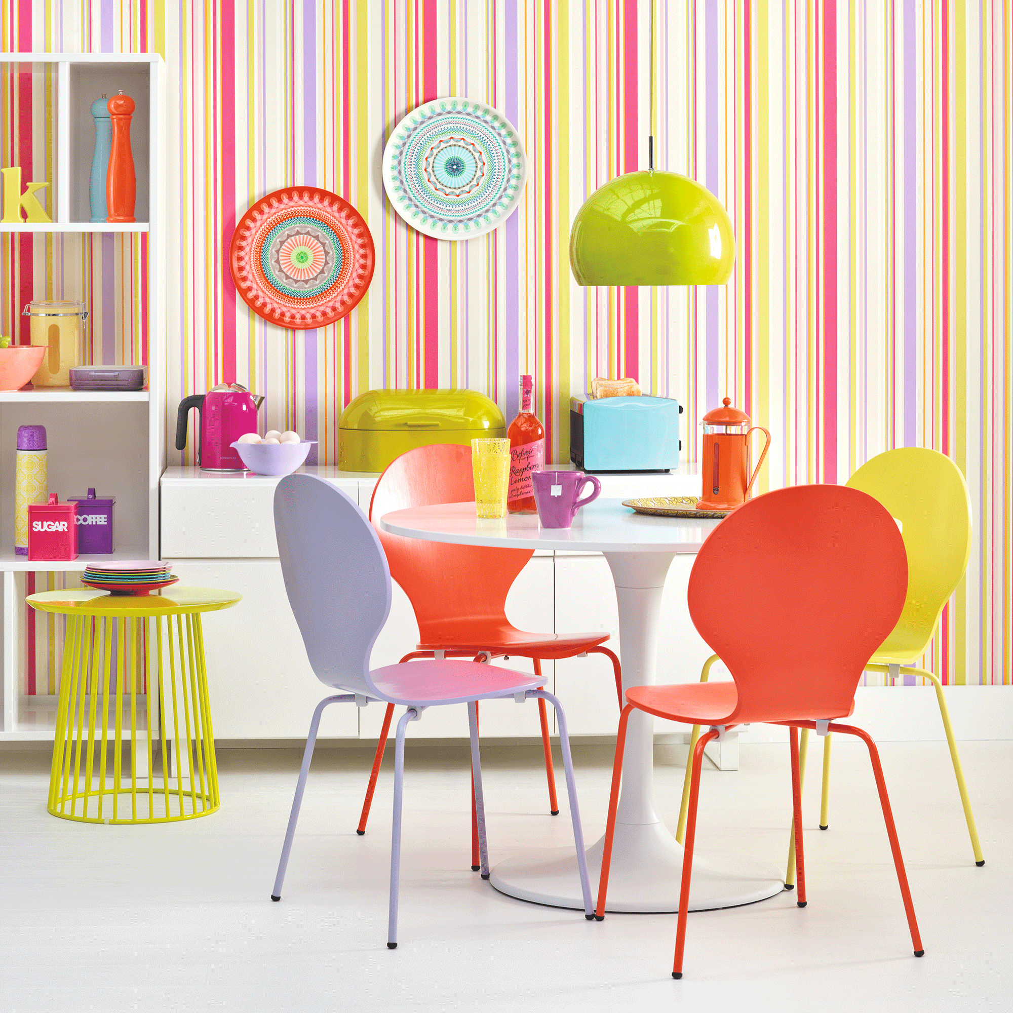Striped walls and coloured chairs