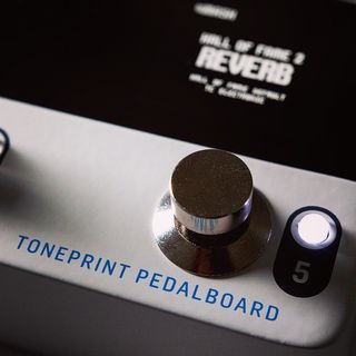 TonePrint Pedalboard: One of what looks like five MASH buttons positioned on a metal enclosure with Hall of Fame 2 Reverb above.