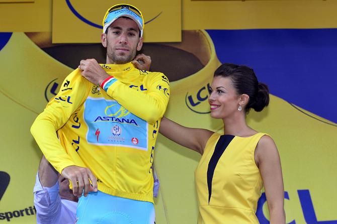 Vincenzo Nibali gets more practice on the yellow jersey podium