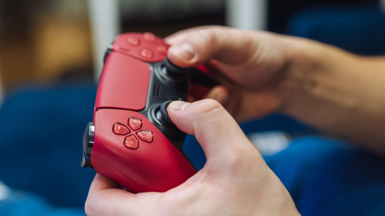 PS5 DualSense controller in red