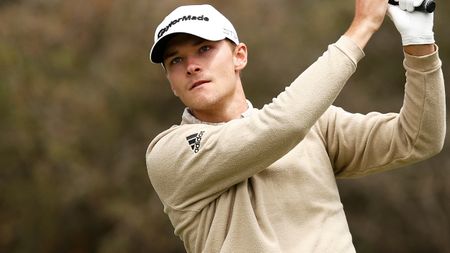 Nicolai Hojgaard takes a shot during the 2022 ISPS HANDA Australian Open