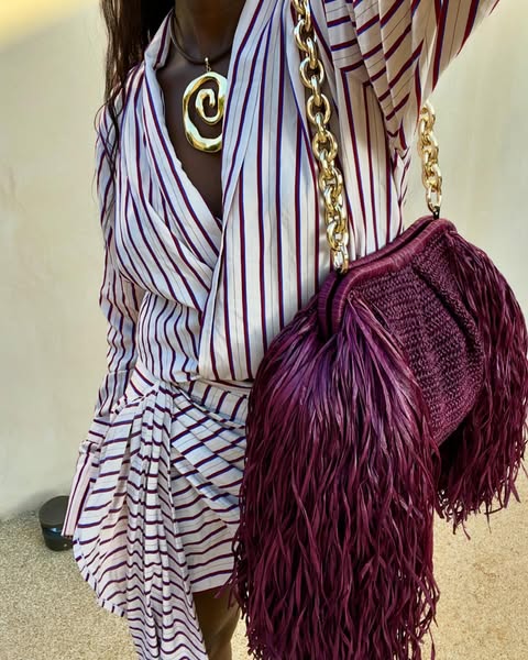 @SpiritedPursuit Wearing a Burgundy and white striped dress with a burgundy handbag