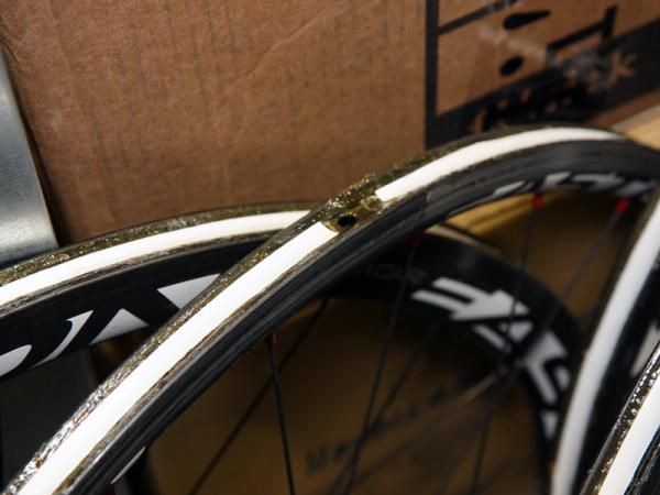 BMC team mechanics use "Belgian tape" when gluing tires.