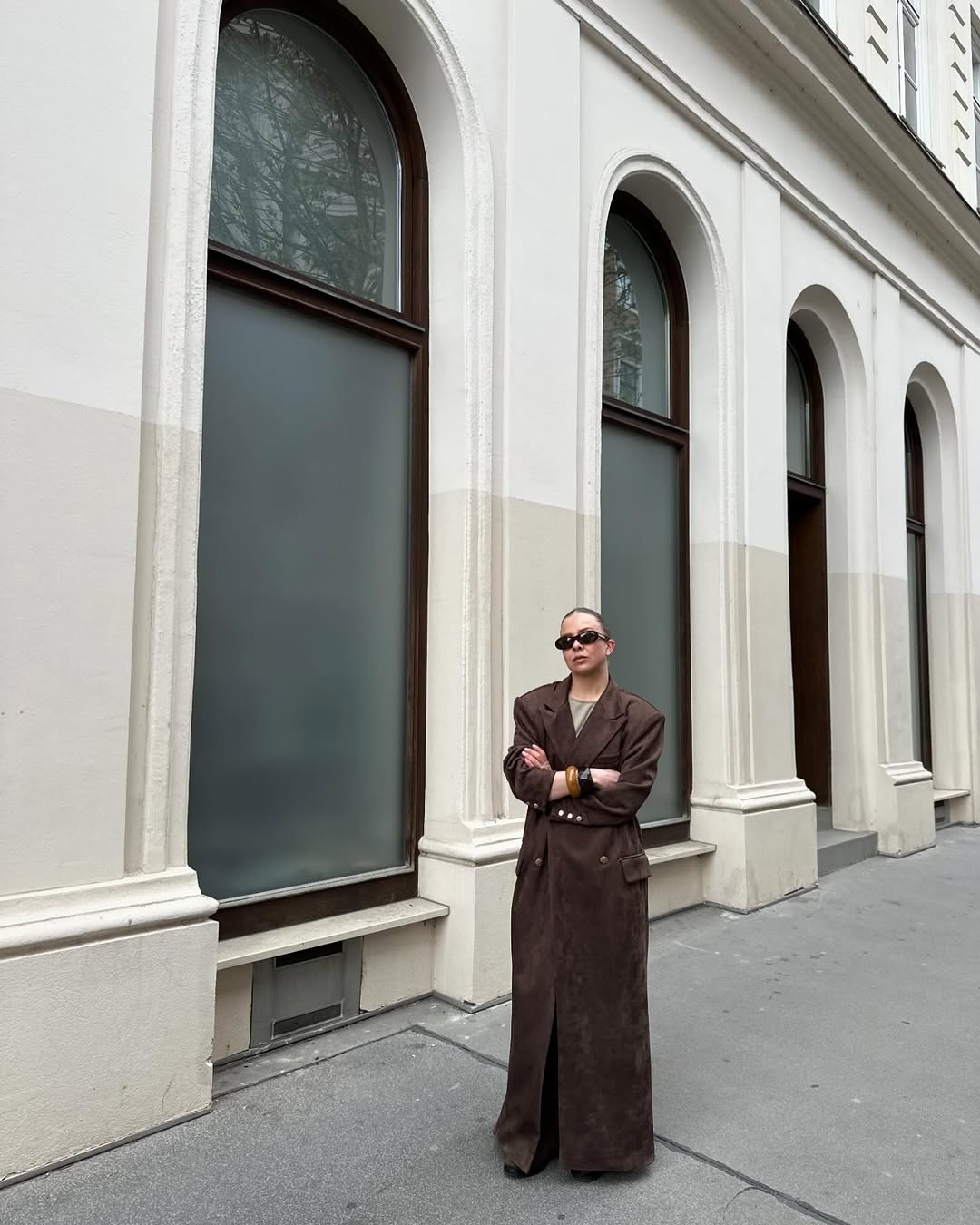 woman wearing brown suede jacket trend