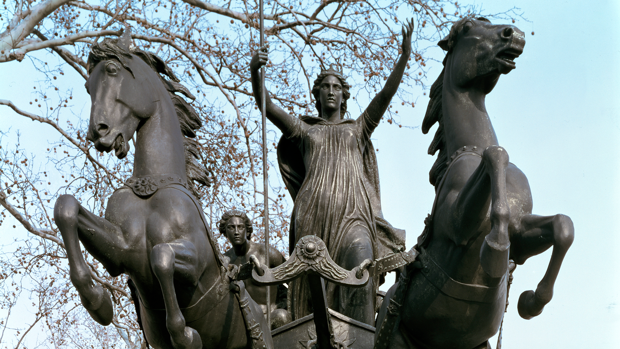 A statue of a woman in a chariot