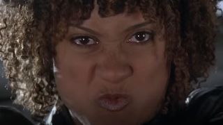 Tracie Thoms with a really angry expression on her face in Death Proof