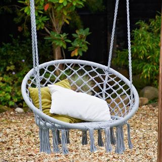 hanging chair with cushion and gravel