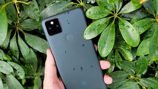 Google Pixel 5a covered in water droplets