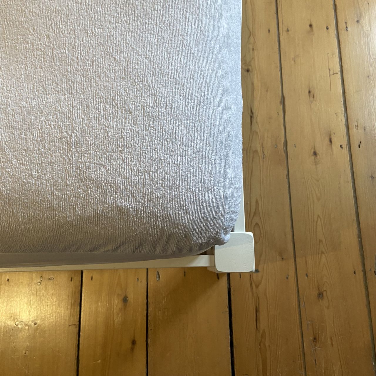 A terry towelling waterproof mattress protector
