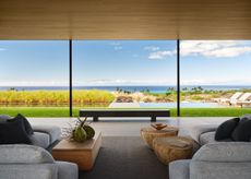 Hawaii house by oslon kundig and leverone design by the sea, tall ceilings, contemporary spaces and art work, and lots of glazing
