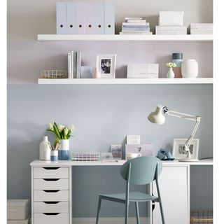 pastel home office with middle stripe bordon desk with chair and table lamp