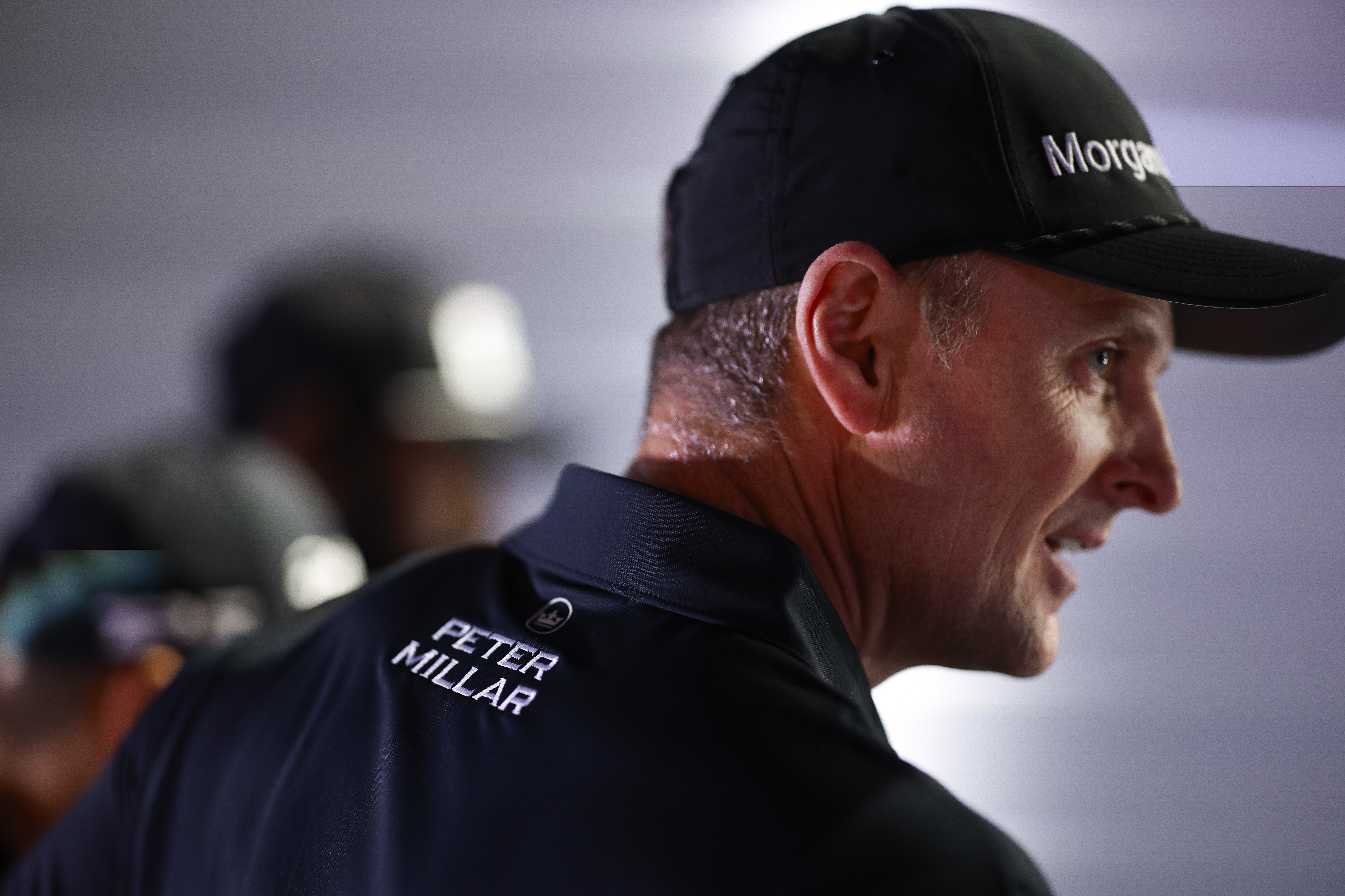 A close-up of Justin Rose's polo