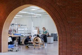brick arch at Hermès' Maroquinerie de Louviers leather production facility by Lina Gotmeh