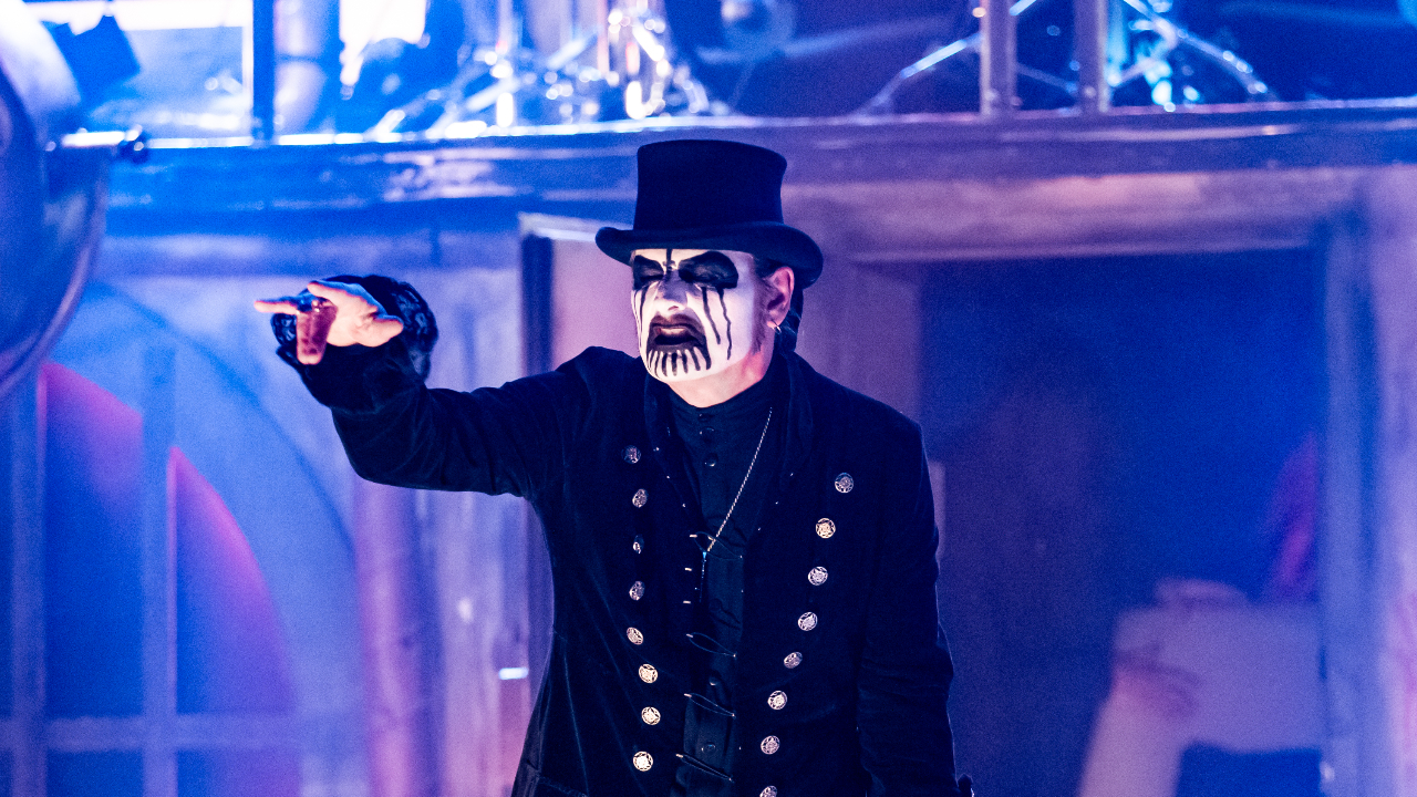 King Diamond flashing the devil horns on stage
