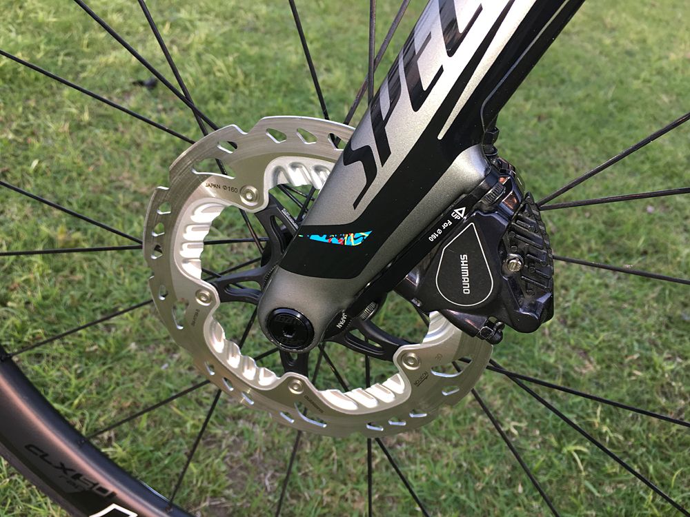 The front 160mm disc and the thru-axel