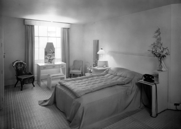 Black and white photographs of a minimalist Art Deco interior
