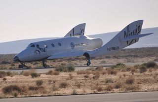 SpaceShipTwo lands at the Mojave Air and Space Port Sunday after completing its first solo flight on Oct. 10, 2010.