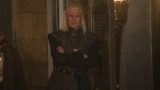 Matt Smith as Daemon Targaryen in House of the Dragon leaning against a wall.