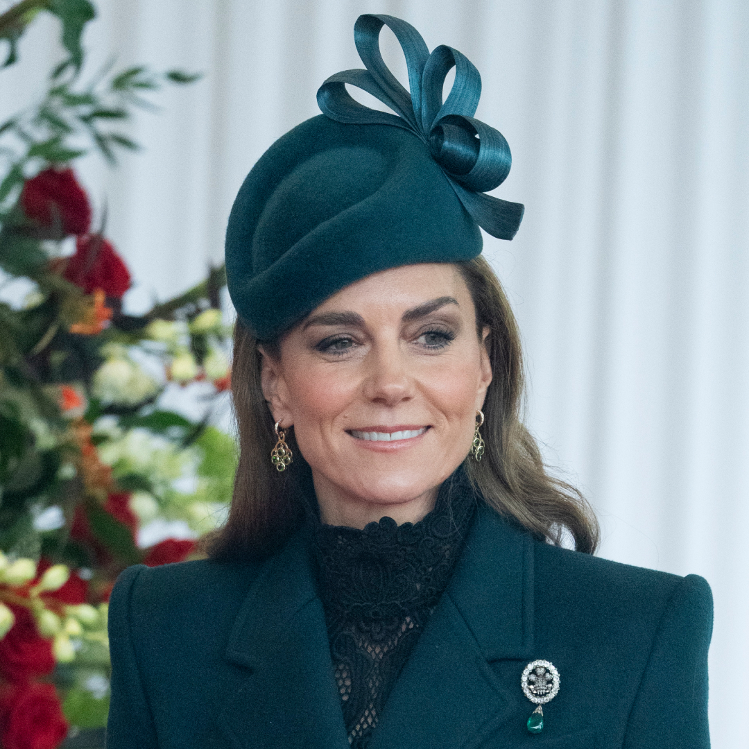 Princess Kate wearing a green hat and coat