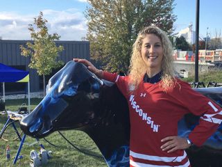 Jolanda Neff received a Univ. of Wisconsin hockey jersey for winning the C2 race at Trek CX Cup