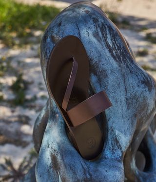 Leather sandals on a rock