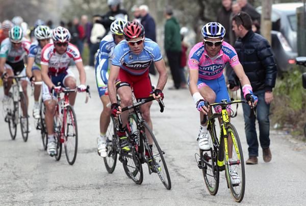 Race leader Cadel Evans (BMC) marks Michele Scarponi (Lampre-ISD).