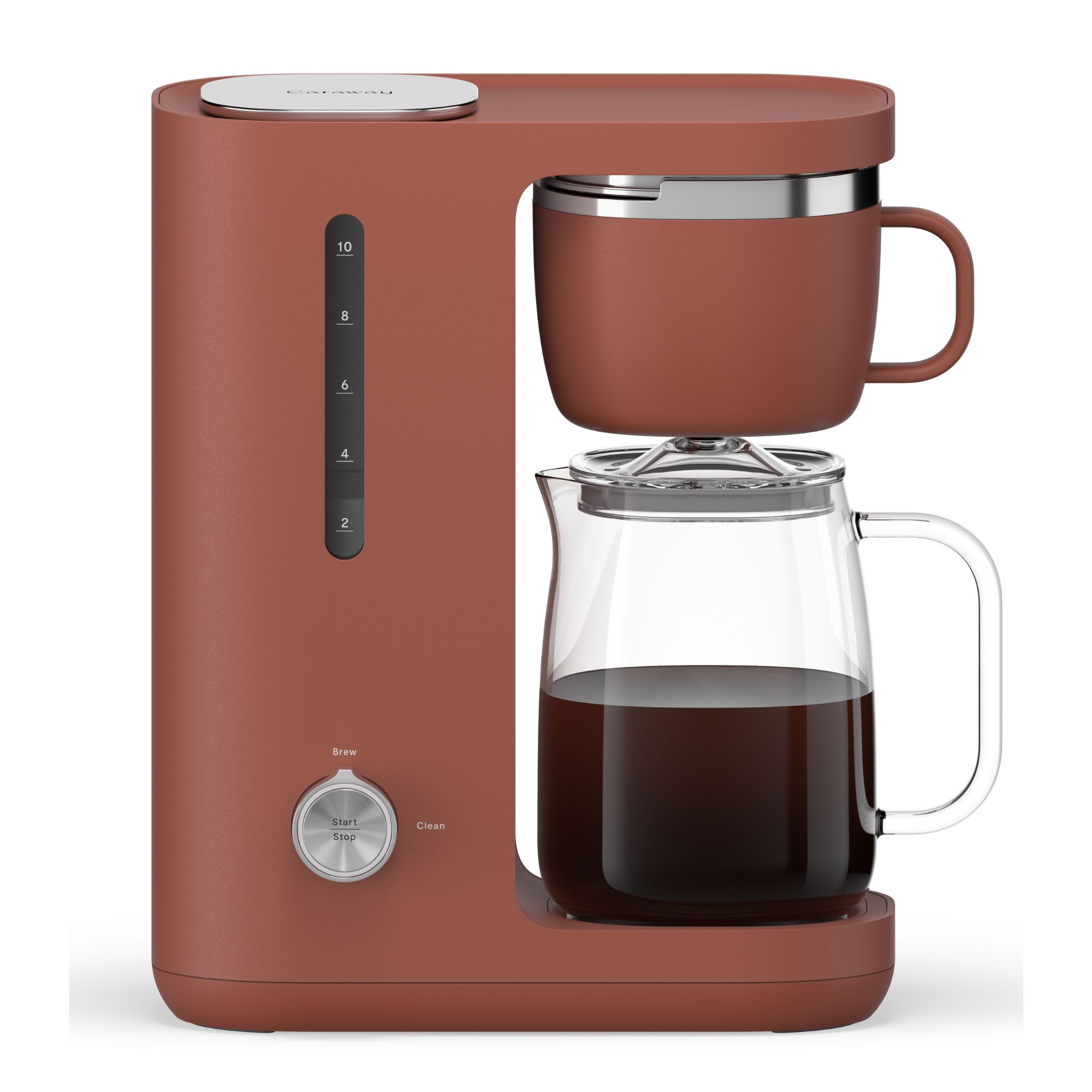 A pink drop coffee maker with a glass carafe half-full of coffee