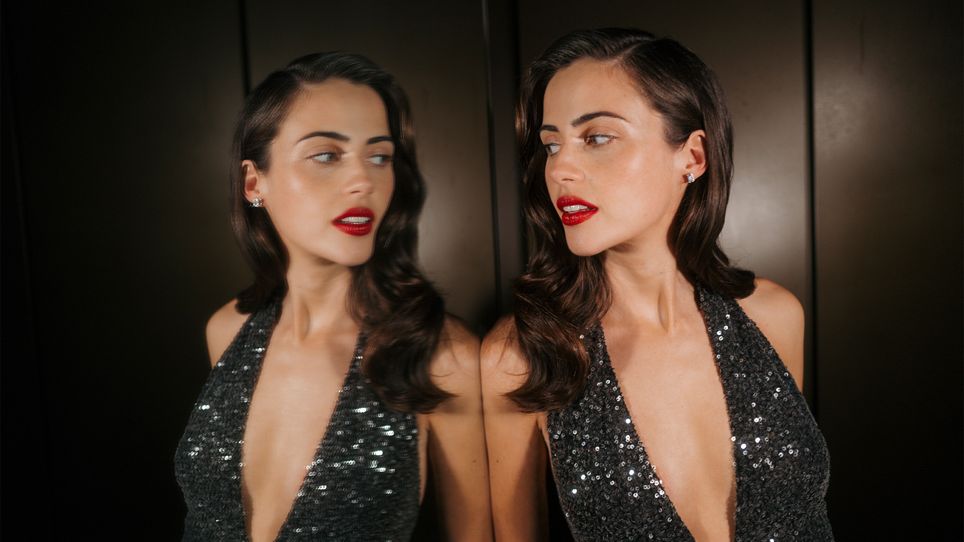 Actress Lydia Peckham looks at herself in the mirror before heading out to the Nuremberg AFI Film Festival premiere.
