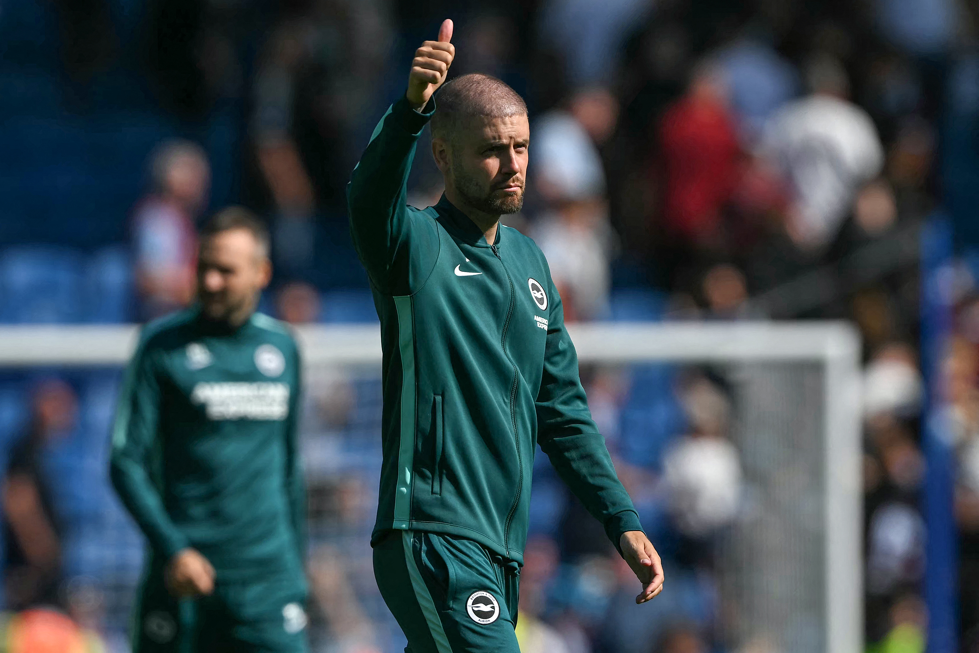 Brighton's German head coach Fabian Hurzeler gives a thumbs up to the fans