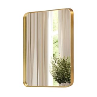 A gold rectangular mirror with curved edges