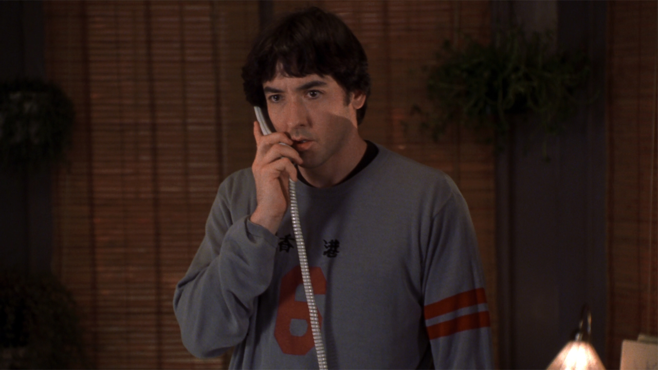 John Cusack as Rob Gordon on phone in High Fidelity