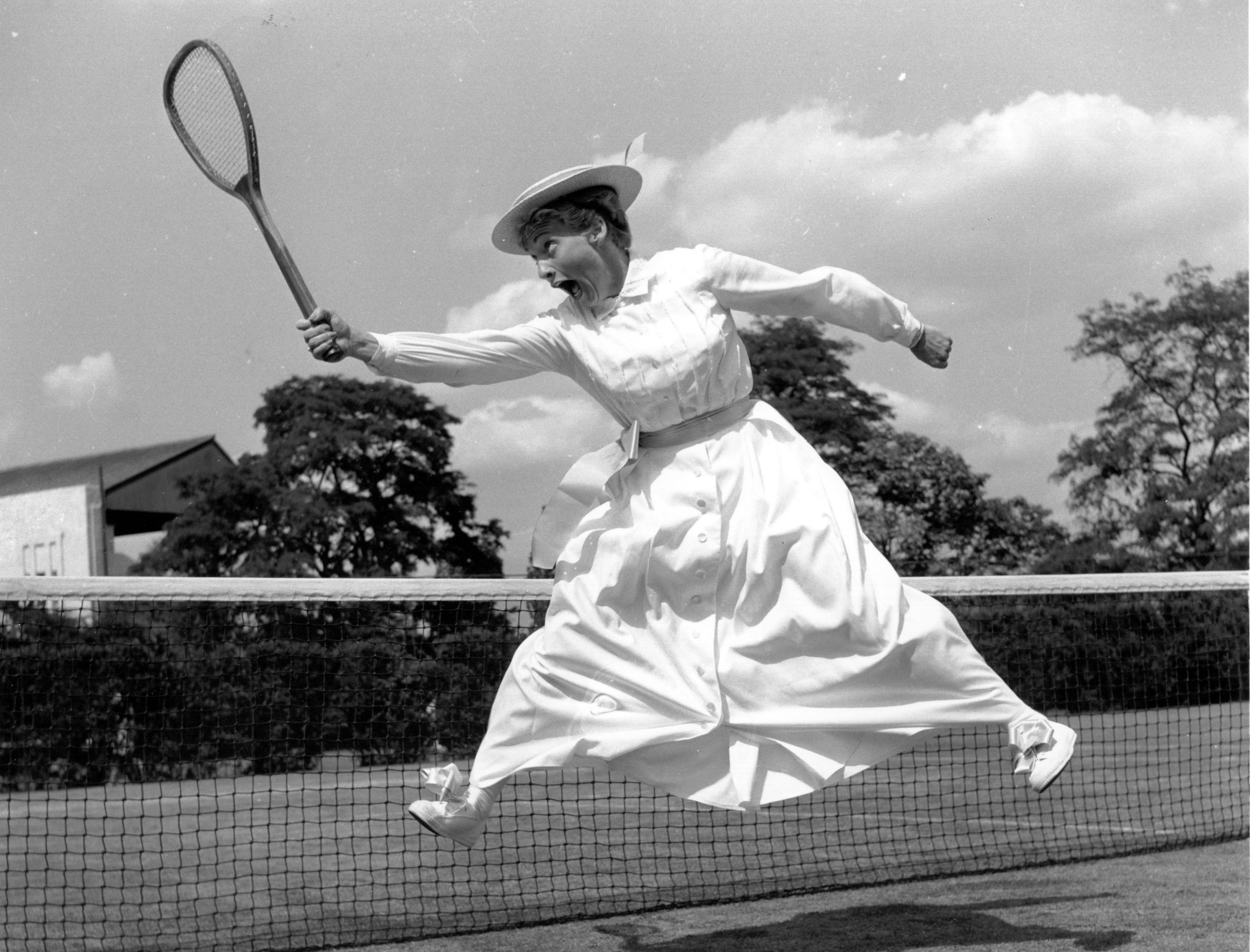 The American tennis player Darlene Hard wearing a period tennis dress at a pre-Wimbledon Tennis party at the Hurlingham Club, London in 1960.