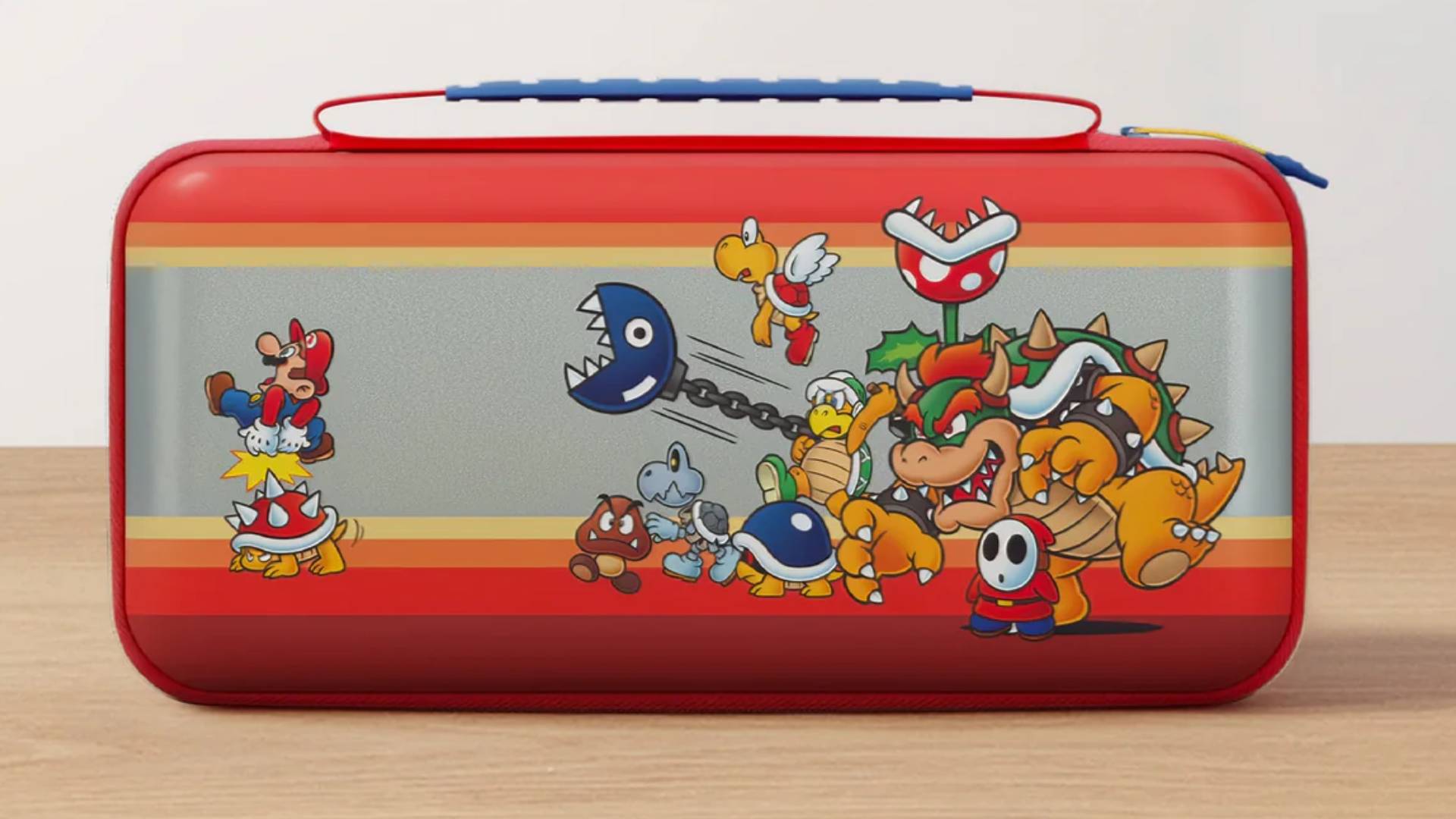 Official marketing image showing the Koopa Troop Switch 2 Turtle Beach case sitting on a wooden desk.