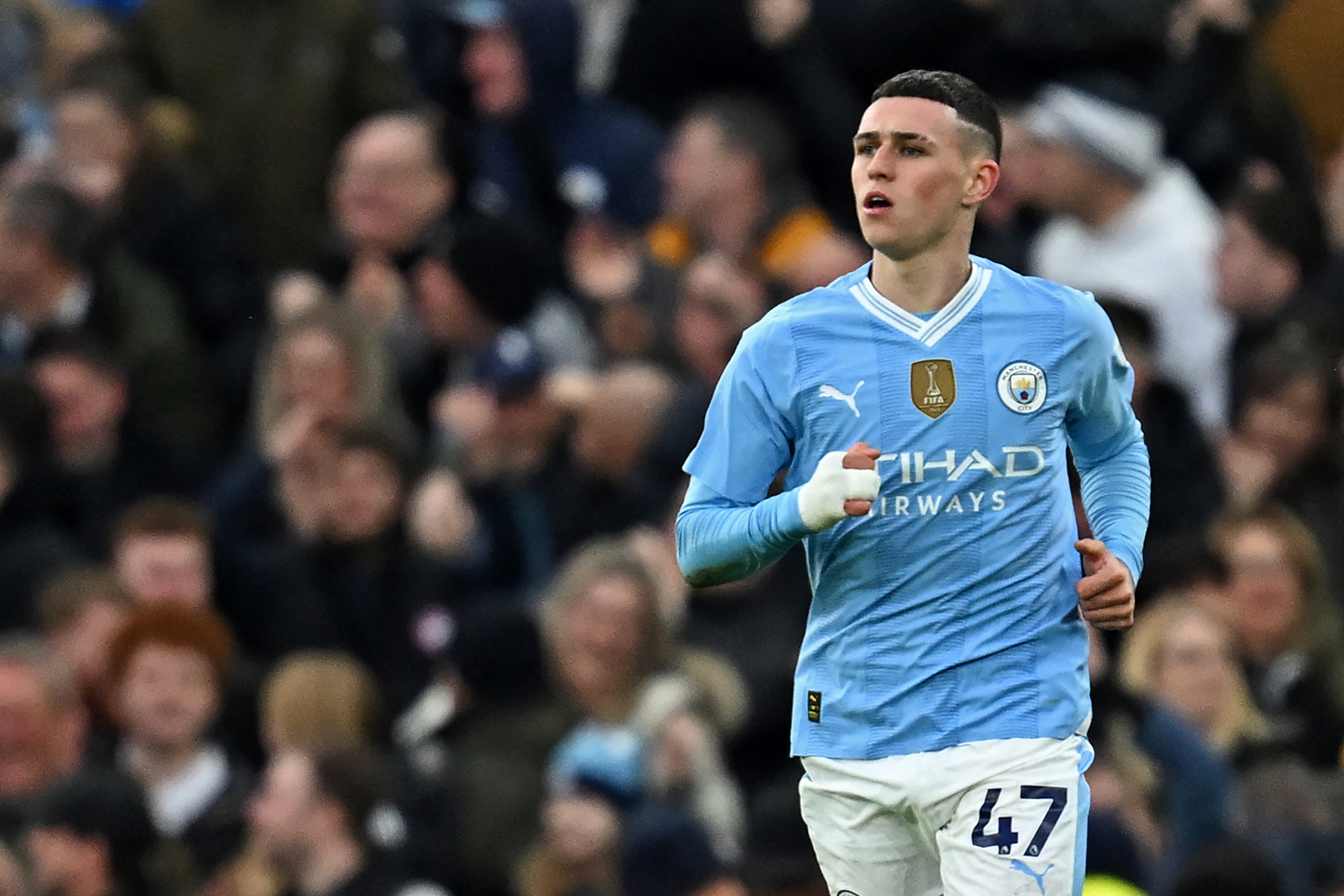 Phil Foden in action for Manchester City.